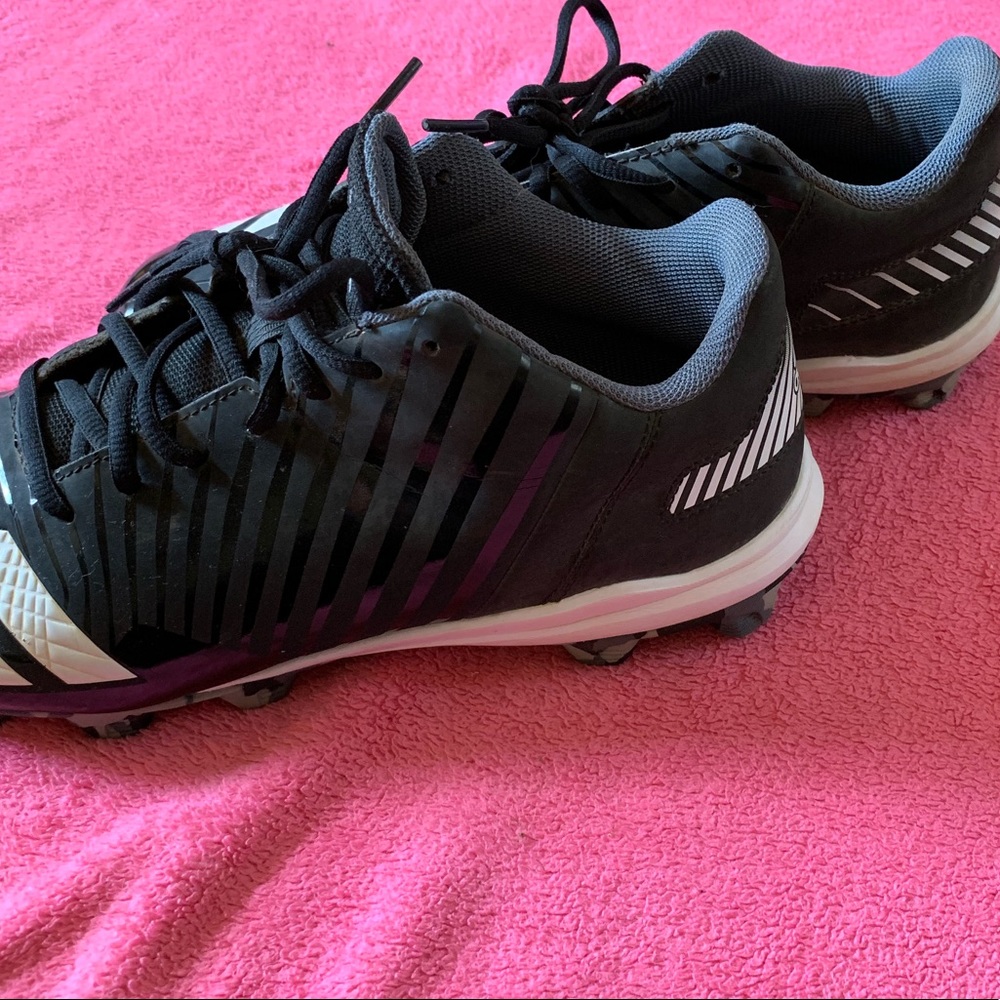 Black Adidas baseball cleats